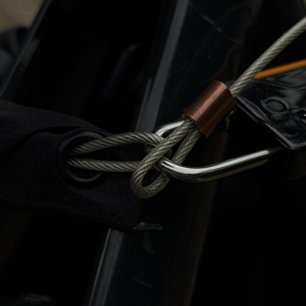 Close-up of Lokko's steel security cable looped through the lock